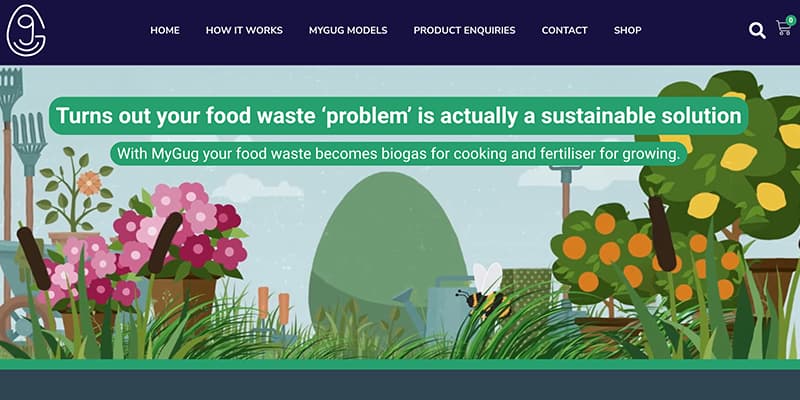A section of a website homepage with a nature-themed illustration. The top portion features a dark blue navigation bar with the website logo on the left and menu options including "Home," "How It Works," "MyGug Models," "Product Enquiries," "Contact," and "Shop." Below the navigation, there is a green banner with bold text that reads, "Turns out your food waste 'problem' is actually a sustainable solution." Underneath, smaller text states, "With MyGug your food waste becomes biogas for cooking and fertiliser for growing." The background illustration shows a green dome surrounded by lush plants, flowers, and gardening tools, suggesting a sustainable, garden-like environment.